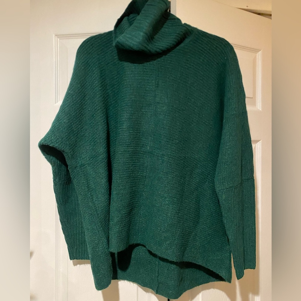 dark green turtleneck sweater